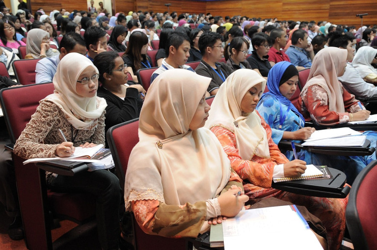 Students in classroom working on entrepreneurship activities